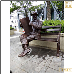 步行街座椅看报人物雕塑铸造厂